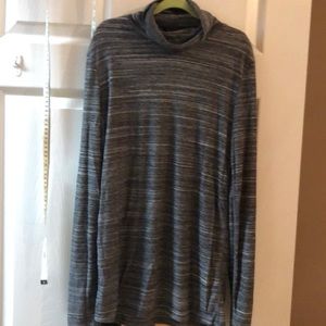 Long gray turtleneck.